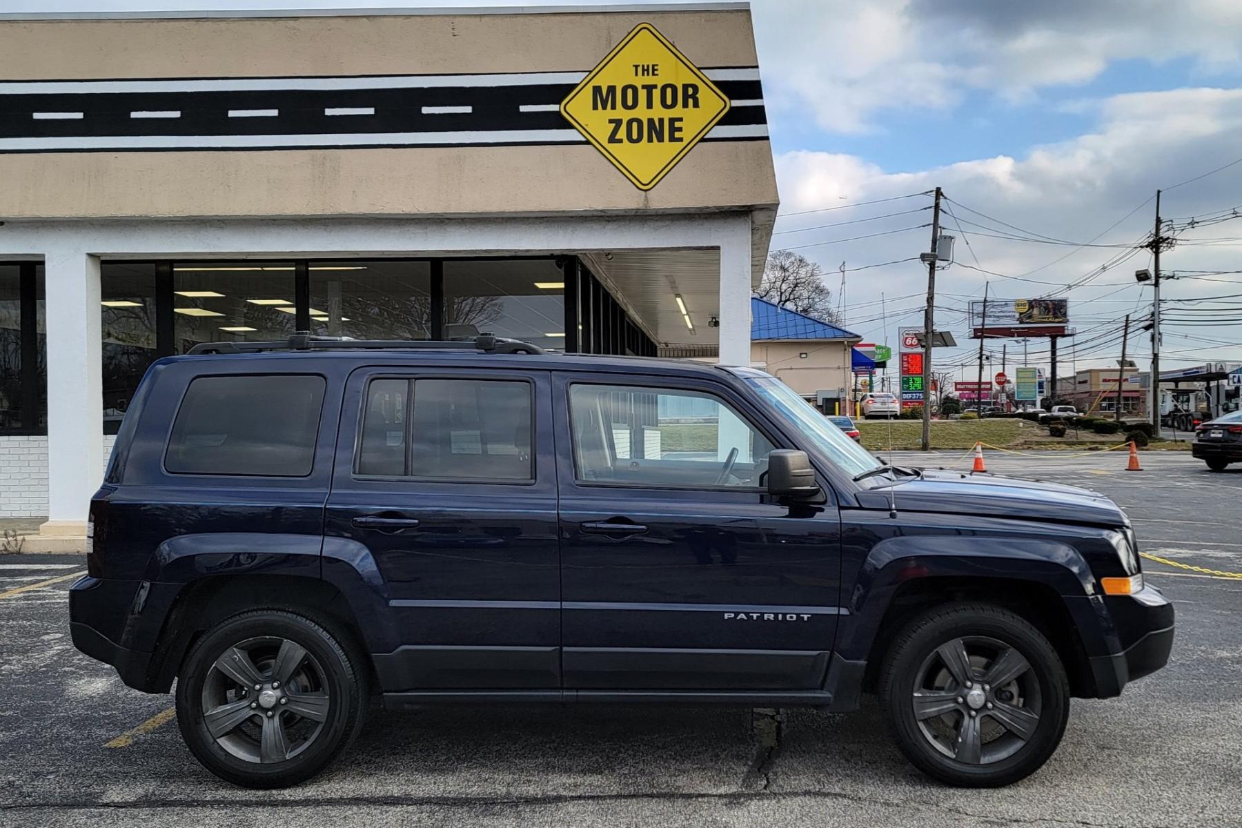 2015 Blue /Black Jeep Patriot Latitude (1C4NJRFB0FD) with an 4-Cyl, 2.4 Liter engine, Automatic transmission, located at 341 N White Horse Pike, Lawnside, NJ, 08045, (856) 262-9500, 39.855621, -75.027451 - Photo #2